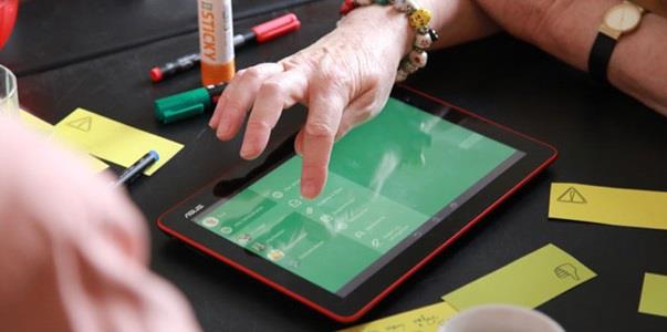 Hands using a tablet